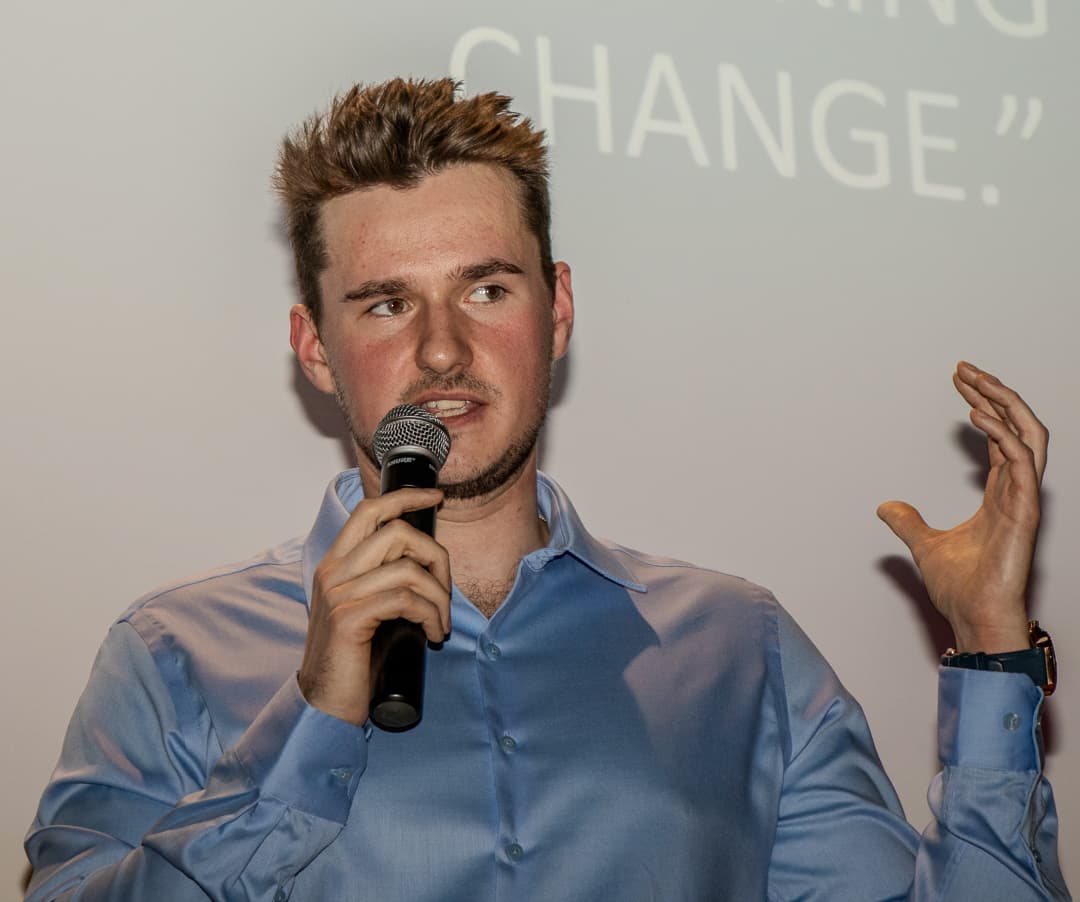 Maxx presenting with book